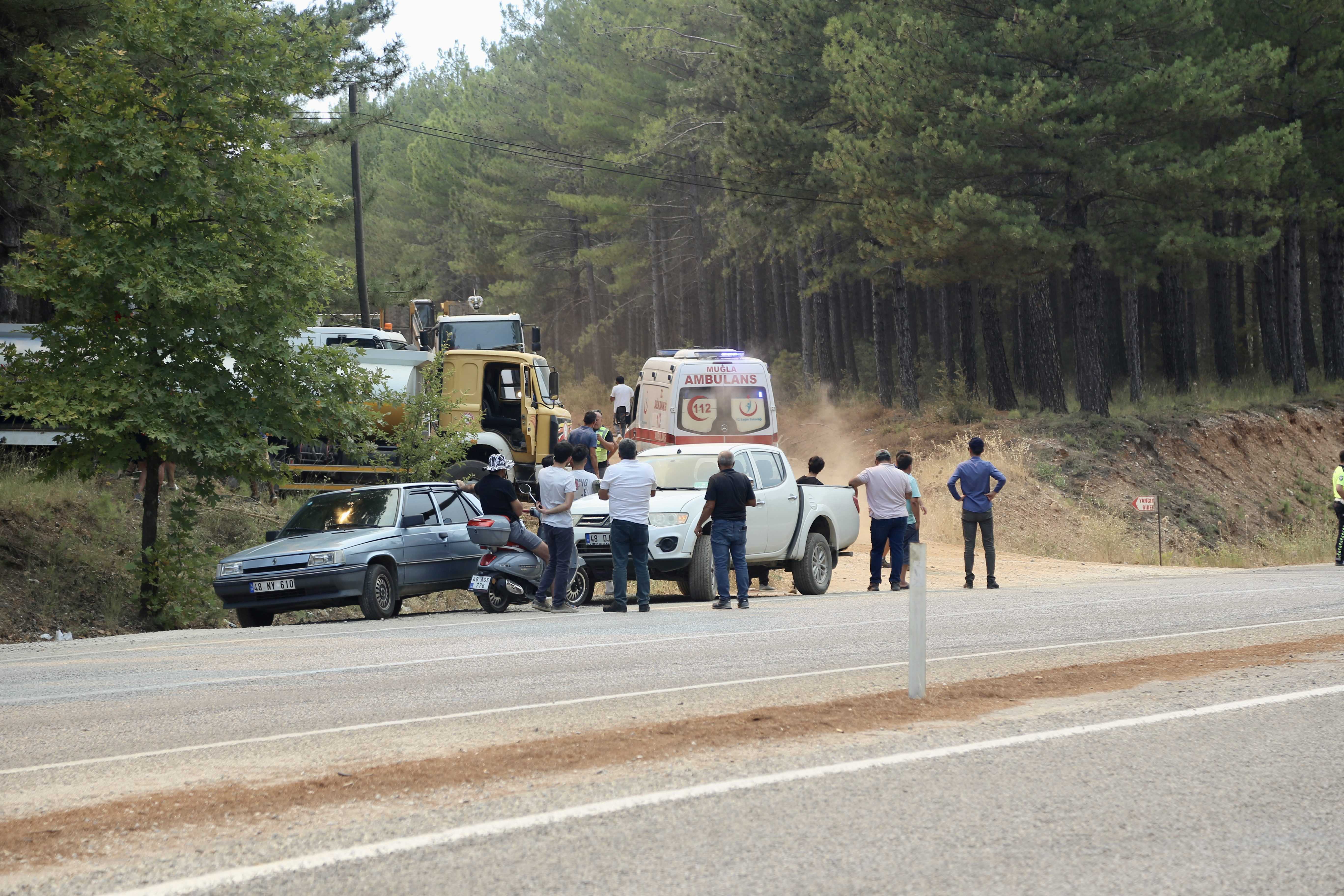 Muğla'nın Ula ve Yatağan'da Orman Yangınları: Tahliyeler Başladı 3 AA 20240818 35432661 35432656 MUGLANIN YATAGAN VE ULA ILCELERINDE CIKAN YANGINLARA MUDAHALE EDILIYOR